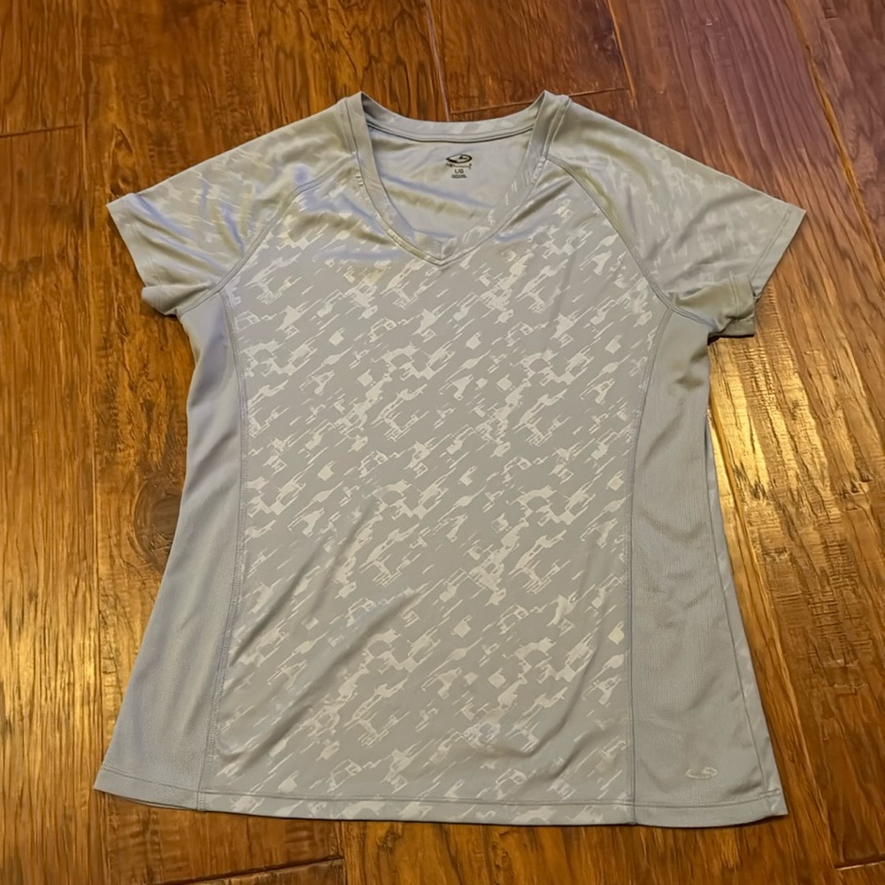 Champion. Gray athletic top. Size large.